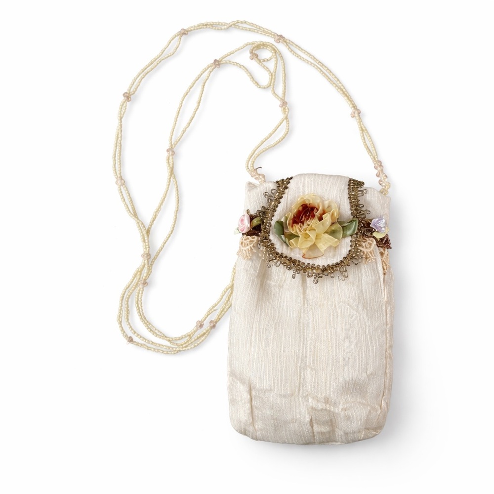 Elegant Cream Beaded Pouch with Floral Accent